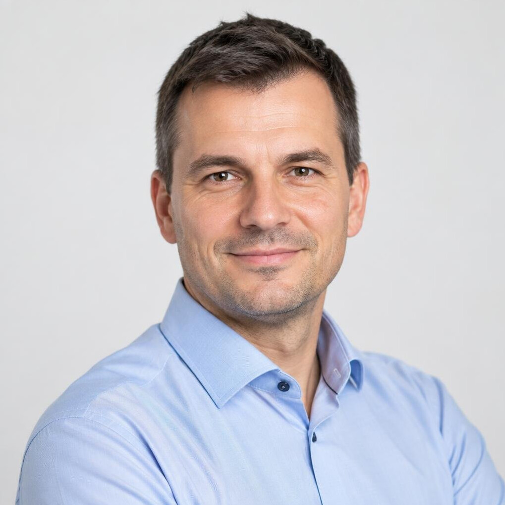 Studio portrait of a Slovenian man in business casual attire